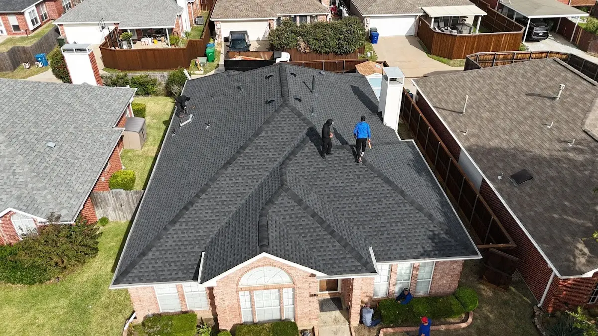Slate & Tile Roof Repair work in progress on a Dodge City property